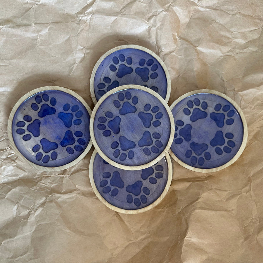 paw print motif coasters. For the animal lovers in all of us!